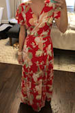 The color on this dress is vibrant and tropical. I find lots of wrap dresses have way too much extra fabric and it ends up making my hips look large, but this dress does not do that! - Madeline B.