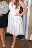 I bought this dress for my bridal shower. I had a tea party theme and thought this dress would be perfect for it. When I received the dress I was surprised to see how great of quality it was. The lace was beautiful and it actually had a lining. I should have maybe sized down and ordered a small but the medium worked out just fine. Overall, I was super impressed and am definitely going to order from lulus again! - Katelyn B.