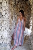 This dress is one of my favorite pieces of Lulus. It fits perfectly, keep in mind of course that if your are petite, you will need to hem it. I do not recommend it if you are very large chested as the coverage may not be enough. The colors are very vivid and don't wash away in time. Every time I wear it people ask me where I got it. Sexy and classy at the same time, a knockout! - Elizabeth