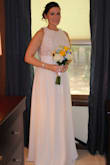 I was so thankful that Lulus worked with me to get the most elegant & perfect fitting dress for my special day. Originally I ordered a medium but was unable to fit the dress comfortably over my breasts. The exchange to size large was seamless & very fast (as I was getting married in 1 week!) I had the shoulders cinched with a straight sewn line in order to bring the waistline to the empire level. The lace top brought such elegance & I loved that the bottom half included a built-in slip followed by two flowing layers of material.  I paired the dress with a pair of 2.5in high wedges so I did not have to alter the length at all. I received so many compliments on this dress & it really contributed to my beautiful wedding. I absolutely recommend this dress & company! - Stephanie D.