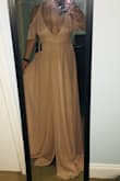 I ordered this as a bridesmaids dress for a wedding. I normally wear a Medium but I experienced that most of the dresses I've ordered from Lulus run a little large, so I opted for a small this time. I LOVE the way this dress looks - the wrap tie allows you to make it as tight or as loose as you need; however, I experienced an issue in the chest area. There simply was not enough material to cover my breasts. I returned the dress and ordered a Medium in hopes that the larger size will give me the coverage I need! - Colleen G.