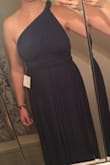 Very versatile dress, you can wear it a lot of different ways! 
Only negative thing is that I have a larger bust and the material that covers the front isn't super thick and it's a hard dress to wear a bra with. - Melinda M.