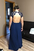 I ordered the dress one size bigger, simply because I'm a bigger girl, it ended up being perfect! Love the material, not cheaply made! I LOVE THIS PRODUCT. It's perfect for bridesmaids dress and can not wait to wear it! - Kaitlyn H.