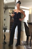 I bought 4 jumpsuits from Lulus hoping that one would fit beautifully.  THIS IS THE ONE!  It's absolutely stunning.  I've already worn it to a gala.  I had women literally walking out of their way to come over and tell me how much they liked my outfit.  It fits like a glove, and I never once felt like I needed to tug on it to keep it up.  I did have to hem it almost 3 inches.  I just bought the hem tape from Target and ironed the hem. Worked perfectly until I can get to a tailor. I bought the navy one and I'm so glad I did because I have a ton of black.  I bet the red one would be killer too!  I took this photo just after hemming, and right before getting into the shower to get ready for the gala, so please forgive the messy look. GO BUY IT NOW.... xoxo! - Dawn D.