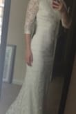 This dress is beautiful. I love the lace and the feel. It's very comfortable and is perfect for my height. Most of the dresses I've tried from Lulus need to be hemmed seriously; my toes just barely peak out, and since I want to wear flats this is perfect. I think it fits perfectly but I know I am very petite through the rib cage and torso. The back bottom has a small bit more fabric that makes it drape lovely and hang elegantly. I love the back cutout as well. I've even purchased a rhinestone belt with a bow that I can opt to wear.
This dress beats all The others I've tried on. I truly love it. - Chelsea C.