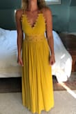 It runs true to size and it is very comfortable! My only complaint would be that it doesn't hit the floor but I am used to that being tall. Beautiful dress! - Suzanne H.