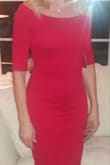 I love the look of the dress. It does run small. I usually take a XS but had to return for a Small and it's still tight but that is the way the dress is meant to be. - Stacey H.