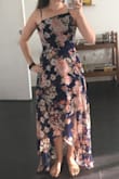 I love love this dress. The neckline is a little weird, it doesn't make as drastic of a statement, but I don't mind it. The fit is so nice, I wear either xs or s but the dress is a little tight so I'm glad I went with a small. I'm pretty short so I expected to have to hem the dress but it's actually the perfect length. The front part is already shorter so I won't step on it but with heels I think the back will be fine as well. And the bottom is flowy so you can always pick it up if walking on grass or something. The print is so pretty and the blue is even brighter in person. - Kelly H.