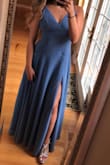 I love this dress. It's so comfortable and the material is very light. There are adjustable straps as well which is perfect. The blue color is so pretty. Was expecting to have to get it hemmed a lot because I'm really short, but with heels it's actually almost the perfect length. The slit in the dress gives it that little bit of classy, yet sexy look that we all want. I'm wearing this to a wedding :) - Marissa A.