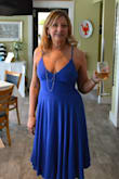 Had to go with a large vs the medium for the rib cage area. Fit is good.  Received many compliments on the dress.  Comfortable!  Does wrinkle some.  But love the dress!!  Should have bought it in red too! - Judy H.