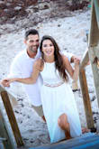 The skirt is very very long, even with heals it will drag. I decided to not get it hemmed and it was very difficult to walk in. I had to hold it while walking. Besides that, it compliments the body very well and looks amazing in photos. I used it for our engagement photoshoot. - Glenya A.