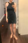 I'm 5'3 and 108 lbs. I wear a 32D.
This dress is cute! The fabric is good quality. It's thick. Definitely a dark navy dress. My butt isn't that big,Ii have a small frame and have to wiggle the dress past my butt. The dress looks best with a strapless bra. - Aeriel T.