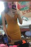 The fit is perfect- not too short, even though I'm 6 feet tall, and fits perfect around the bust and waist. Love the color and neckline too; would definitely recommend!! - Amanda R.