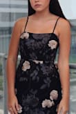 This dress is really flattering and super pretty. I sized down and still had a little room to be comfortable and yet it was still form fitting. - Emily K.