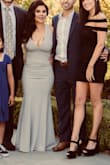 Was VERY skeptical to purchase this dress which was a final sale, but for $26; what the heck! I was extremely pleased with the quality and fit of this dress. It is definitely very long, but I know that I'm super petite and I'm used to getting things hemmed (this alteration cost me $40 b/c there was so much material) totally worth it considering the whole dress was still under $100!
Very sexy, but not trashy. So glad I ended up getting it for my event. After reading reviews on fit, I purchased a size Small in grey. - Darlene F.