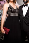 Purchased for a gala I attended in San Francisco. I'm tall and slender - 6.0 - and it fit perfectly once I adjusted straps. Looked beautiful and very comfortable, too. - Fiona J.