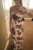 The cut of this dress & fabric makes dress makes me feel tall & slim! I am big busted so I love that the top ties in the back & is adjustable :) - Cherisse L.