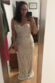 I was pretty nervous ordering this dress, because there were no reviews about it- but I had to see if it would fit because it's so gorgeous on the model. I was pleasantly surprised that it fit almost perfect, and I will be wearing it for my wedding on a private yacht in Mexico this winter! I will be barefoot, so I am having it shortened, but other than that it's wonderful. Great quality of material, and seems worth a lot more than I paid! - Emily S.