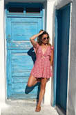 This romper is the perfect pop of color to any outfit. Length is perfect for smaller girls, but it is super flowy! So be careful on windy days to not flash anyone. The tie front is on trend and the sleeves make this such a cute romper to wear from spring into early fall. I always feel like a standout in it. Love it! - Kaitlyn E.
