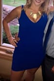 Great Dress! The color was fantastic, tight fit but that was to be expected. I could have gone up a size but didn't want it to be too big so was happy I went with the Medium. Super cute and flattering but it is low cut in case you don't like that. - Laura O.