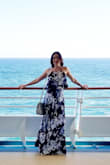 I wore this on a cruise and it was PERFECT. Runs long on my height, but I wore high heels and it was fine. - Krystina M.