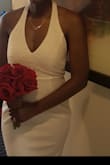 I wore this dress for my not-so-formal Vegas wedding. I loved it, but the only issue I had was that halter top area was longer than my torso. I had to use pins to secure it tightly. - Lettia B.