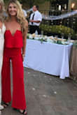 This jumper was perfect for my friend's wedding! The fit was super flattering and made the booty look good. The color was a vibrant red, not as orange, which I like. I did take it to the tailor to get hemmed because the original cut was too long, even with a 4" heel. I highly recommend! - Holly N.