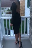 This dress is the perfect about of sexy and sophisticated! Isn't as low in the back as it looks in the stock photo which I liked. The outside seam in the back actually has wiring in it to keep it from moving or revealing too much. Highly recommend! A little tight, but worth it! - Stephanie M.