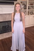 My daughter wore this dress for the pep rally portion of homecoming court and looked stunning. We had to get it hemmed. Ordered a small and fit perfectly other than the length. - Rochelle