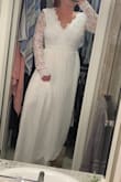 This dress is absolutely breath taking!
I was going back and forth on sizing but I ended up ordering a medium and it fits true to size. It's a great material and is a pretty thick heavy dress. - Courtney B.
