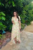 This came right on time, as I had nothing to wear for my co-worker's wedding! I am so happy I went with a floral dress for the occasion. I got sooo many compliments! The fit was perfect and gave me an inch of leg room due to it being a wrap dress and the fact that I love to eat haha. The material was soft and easy to run through my steamer at home. I ended up pairing this dress with gold earrings and brown wedges. I'm looking forward to wearing this again next week to a picnic. You can't go wrong with this dress! - Rona D.