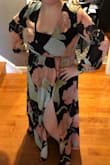 This dress is so beautiful in person and makes me feel that way also. I range from a 14-16 in dresses and I think this one fits great. The material of the sleeves is not as stretchy and due to my larger bust/shoulders, I am wearing a cami underneath. I love it so much and you won't regret this purchase! The colors are great for any season and I am so excited to wear it. - Alix B.