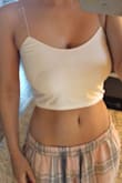 This is the perfect bra top I have been looking for. Its tight enough just to keep my chest from moving too much but not uncomfortable at all. I love the skinny straps too so it goes with all my tank tops. I use those pasties as well because it is see through! :) - Cristina O.