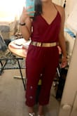 Bought this for a "dressy casual" wedding and it's very comfortable and looks great! Love the color. The fit is very adjustable with both the halter tie and elastic waist. I did get a belt to dress it up, because the elastic waistband looks like it needs something a little extra and doesn't always sit straight across the waist otherwise. Solid basic jumpsuit overall, and very easy to dress up or down! - Janice P.