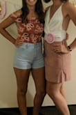 LOVE this skirt. I ended up buying a large because I wanted it so bad and the Medium was out. It was a little big and I would have fit in a medium extremely well, but nothing a tailor cant fix. Felt sexy all night and it was the perfect length. Wore for my bachelorette weekend. - Leah M.