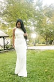 The material is perfect. The lace detail and fitted material really hugs the curves. I will have to get it hemmed, but I am 5'2 and already expected to. This is a stunning dress. - Sylvia B.
