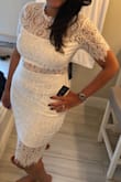 Very nice dress. Looks exactly like the picture. Nice fabric, not see through. - Tamara C.
