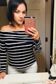 I've been eyeballing this top for quite a bit, I finally decided to order it and I have no regrets. It runs a bit loose but it feels great not having something too tight. I am very excited to wear on a date night. It looks and feels very sensual, great with white jeans. Thank you Lulus. - Alba M.