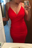 Absolutely love this. Thick, stretchy fabric that feels to be great quality. Hugs every curve of mine in the right way. Only *complaint* is the lapels of fabric where the straps meet in the front seems ever so slightly too big, even though I'm a 34D. May need to take in fabric there slightly but aside from that the dress is gorgeous. - Kaitlyn B.