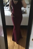 This dress fits me perfectly, I expected it to be too long but when I wear heels it's perfect. At most, I will need it to be hemmed an inch. It's very comfortable and fits my body like a glove. I will most likely need to wear a push up bra to fill the dress out but that's okay! I needed an elegant dress for my boyfriend's military ball and this is exactly what I was looking for. - Hailey B.