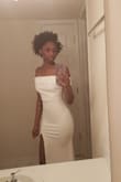 I was searching for a simple but still elegant wedding dress for my private, simple wedding in January of 2019. I ran across this dress and was hesitant because I have slight curves but am small and I'm quite tall so nothing usually fits right. 
I was blown away by this dress! It's form fitting and flattering and it goes all the way down to my feet! It's sexy but still appropriate for the wedding! I love it! - Erin B.
