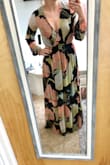 I just received this dress in the mail and I love it. I sized down after reading reviews. I'm usually a medium in everything, but ordered a small in this and I'm glad I did. I ordered a pair of 3-inch heels from Lulus as well for this dress and the length was perfect with them on. It is really low cut so I'll have to figure out a way to pin it together. Overall obsessed with it and can't wait to wear it! - Lauren H.