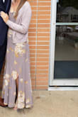 This was a bit long on me, but was the perfect length in heels. I got a lot of compliments on it and I felt beautiful in it! It's lovely and flowy, and great for a formal wedding. I did have to tighten the straps to the tightest setting for it to cover my chest, but I love that you can adjust the straps, which is a nice feature. I paired it with a cardigan because it was cold the day of the wedding. - Kelsey R.