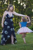 I originally bought a Large but had to exchange for an XL as the large was too small on my chest, it was extremely revealing. The XL was still a little revealing and loose in the chest but I was able to put bra inserts in to fill it out a bit as I wasn't able to wear a bra. I wore it in our engagement photos and absolutely loved the look. I got so many compliments on it. I've worn it to a wedding as well and everyone loved it. I'm just waiting for another opportunity to wear it! - Mikayla H.