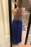 This dress was perfect for a formal I had to attend! I have a larger bust so it was a bit difficult to squeeze over them at first and I definitely needed help making sure the back was criss-crossed right, but I wouldn't change a thing. It fit perfectly once it was on and looked extremely cute! It was a great length too, not super long and with heals it hit the floor perfectly. - Alissa L.