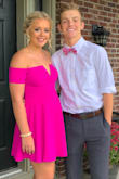 Exactly what I wanted! I wore it for my senior year homecoming and got so many  complements. The fuchsia pink is super hard to match (with a guy) though. The dress is different colors if you use flash as well. Love love love the dress! High quality material and fits just right! - Grace M.