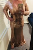 I ordered this as a bridesmaid dress. I ordered an XL and it is SUPER long. It's about another foot longer than I am so I will need to get it hemmed. Large chested women will have a hard time with this dress as my chest fits just right. Other than that, the fit is good. The big drawback is that the sequin are constantly falling off. I only wore it once to try it on until the wedding and I have a trail of where I walked with it on. I hope it makes it through the wedding... - Erin L.