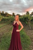 Bought this without knowing whether to get a small or medium, but the reviews were so helpful! I have a broader upper body and was worried the dress would be too tight. It was snug, but not too small at all. Dress was VERY long, so had to hem quite a bit, but otherwise it was beautiful, so flowy and romantic! I got many compliments :) - Lindsay G.