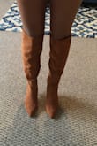 These are perfect for petite girls like me. They hit right at my knees. I would recommend at least going up a 1/2 size as they fit a bit snug due to the pointed toe design of the boots. Great fall color. Thank you Lulus for keeping short girls in mind. Keep the boots coming!! - Vernessa C.