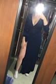 The dress fits perfect. I had to order a smaller size because they didn't have the size i needed but still fits well. The material is really nice and lightweight also. Going to be a nice dress for the wedding I'm in, in a couple weeks. - Teagan A.